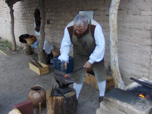 Dennis Buller Forgeing an eating fork at Spanish Colonial Blacksmithin Demonstration