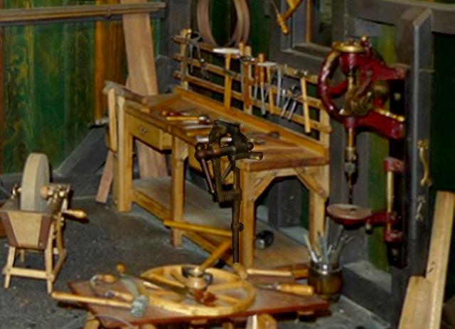 Bench with two vises and other tools.