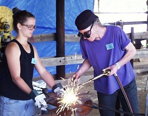 Paige assisted by Andi Steele