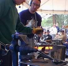 Urri and Amit punching a hole