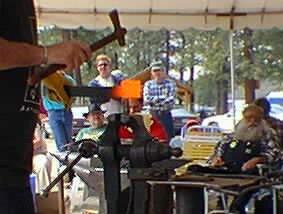 Uri Hoffi working on tongs